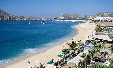 Looking down pristine El Médano Beach towards Cabo San Lucas.